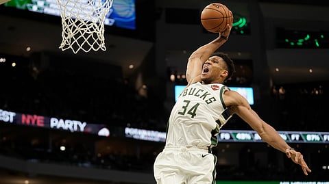 Milwaukee Bucks' Giannis Antetokounmpo dunks during the second half of an NBA basketball game against the Indiana Pacers Sunday, Dec. 22, 2019, in Milwaukee. The Bucks won 117-89.