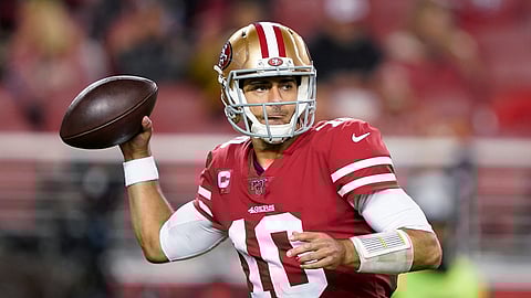 San Francisco 49ers quarterback Jimmy Garoppolo throws a pass against the Los Angeles Rams during the second half of an NFL football game in Santa Clara, Calif., Saturday, Dec. 21, 2019.