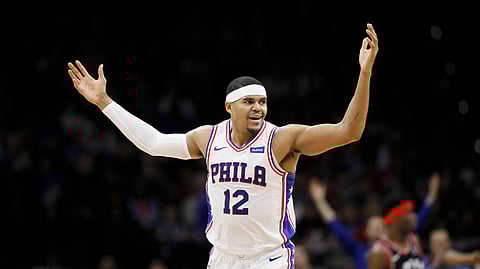 Philadelphia 76ers' Tobias Harris reacts after making a basket during the first half of an NBA basketball game against the Toronto Raptors, Sunday, Dec. 8, 2019, in Philadelphia.