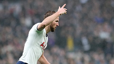 Tottenham's Harry Kane celebrates after scoring his side's first goal during the English Premier League soccer match between Tottenham Hotspur and Brighton & Hove Albion at the Tottenham Hotspur Stadium in London, England, Thursday, Dec. 26, 2019. (AP Photo/Petros Karadjias)