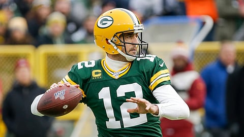 Green Bay Packers' Aaron Rodgers throws during the first half of an NFL football game against the Washington Redskins Sunday, Dec. 8, 2019, in Green Bay, Wisconsin.