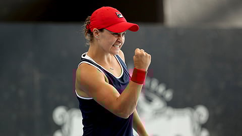 Australian Ashleigh Barty celebrates her win over Ukrainian Dayana Yastremska during their Adelaide International tennis match in Adelaide, Saturday, Jan. 18, 2020. (AP Photo/James Elsby)