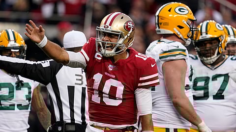 How many first downs will San Francisco 49ers quarterback Jimmy Garoppolo be pointing to this Sunday? (AP Photo/Tony Avelar)