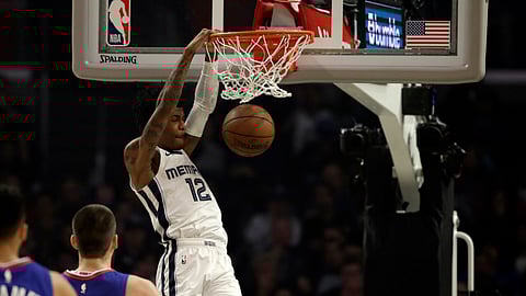 Memphis Grizzlies' Ja Morant (12) dunks against the Los Angeles Clippers during the first half of an NBA basketball game Saturday, Jan. 4, 2020, in Los Angeles. (AP Photo/Marcio Jose Sanchez)