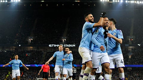 Manchester City's Gabriel Jesus, second right, celebrates with teammates after scoring his side's opening goal during the English Premier League soccer match between Manchester City and Everton at Etihad stadium in Manchester, England, Wednesday, Jan. 1, 2020.