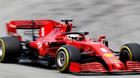Ferrari driver Sebastian Vettel of Germany steers through a corner during the Formula One pre-season testing session at the Barcelona Catalunya racetrack in Montmelo, outside Barcelona, Spain, Thursday, Feb. 27, 2020. (AP Photo/Joan Monfort)