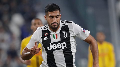 FILE - In this file photo dated Tuesday, Oct. 2, 2018, Juventus midfielder Emre Can during a Champions League, group H soccer match against Young Boys, at the Allianz stadium in Turin, Italy. Emre Can has joined Borussia Dortmund on loan from Juventus, according to a club announcement Friday Jan. 31, 2020. (AP Photo/Luca Bruno, FILE)