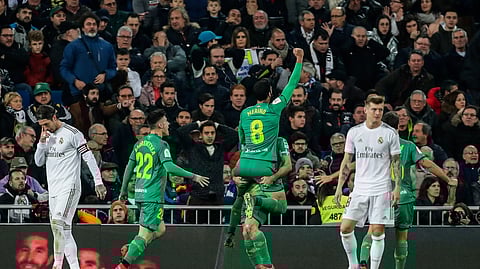 Real Sociedad players, center, celebrate after scoring the fourth goal during a Spanish Copa del Rey soccer match between Real Madrid and Real Sociedad at the Santiago Bernabeu stadium in Madrid, Spain, Thursday, Feb. 6, 2020.