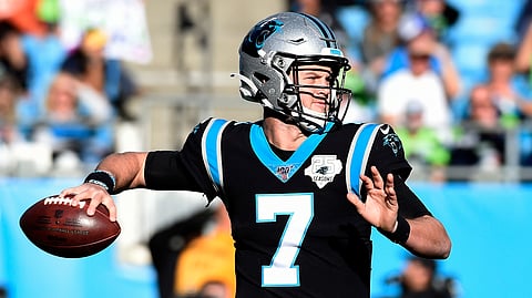 FILE - In this Dec. 15, 2019, file photo, Carolina Panthers quarterback Kyle Allen (7) passes against the Seattle Seahawks during the second half of an NFL football game in Charlotte, N.C. A person with knowledge of the move tells the Associated Press the Washington Redskins have acquired quarterback Kyle Allen, Monday, March 23, 2020, in a trade with the Carolina Panthers. (AP Photo/Mike McCarn, FIle)