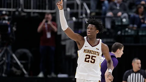 Minnesota's Daniel Oturu (25) reacts during the second half of an NCAA college basketball game against Northwestern at the Big Ten Conference tournament, Wednesday, March 11, 2020, in Indianapolis. Minnesota won 74-57.