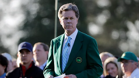 FILE - In this April 5, 2018, file photo, Augusta National Golf Club Chairman Fred Ridley watches the honorary first tee shots before the first round at the Masters golf tournament in Augusta, Ga. Augusta National decided Friday, March 13, 2020, to postpone the Masters because of the spread of the coronavirus. Club chairman Fred Ridley says he hopes postponing the event puts Augusta National in the best position to host the Masters and its other two events at some later date. Ridley did not say when it would be held.(AP Photo/David J. Phillip, File)