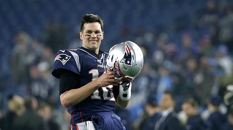 In this Jan. 4, 2020, file photo, New England Patriots quarterback Tom Brady warms up before an NFL wild-card playoff football game against the Tennessee Titans in Foxborough, Mass. Tom Brady is an NFL free agent for the first time in his career. The 42-year-old quarterback with six Super Bowl rings said Tuesday morning, March 17, 2020, that he is leaving the New England Patriots.