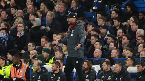 Liverpool's manager Jurgen Klopp shouts out from the touchline during the English FA Cup fifth round soccer match between Chelsea and Liverpool at Stamford Bridge stadium in London Tuesday, March 3, 2020.