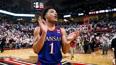 In this March 7, 2020, file photo, Kansas' Devon Dotson (1) celebrates after an NCAA college basketball game against Texas Tech in Lubbock, Texas. Kansas finished the season No. 1 in The Associated Press college basketball poll, receiving 63 of 65 first-place votes from a national media panel Wednesday, March 18, 2020.