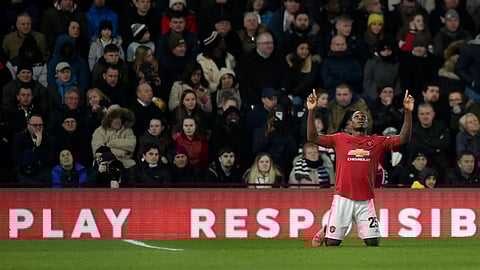 Manchester United's Odion Ighalo celebrates after scoring his side's third goal during the FA Cup fifth round soccer match between Derby County and Manchester United at Pride Park in Derby, England, Thursday, March 5, 2020.