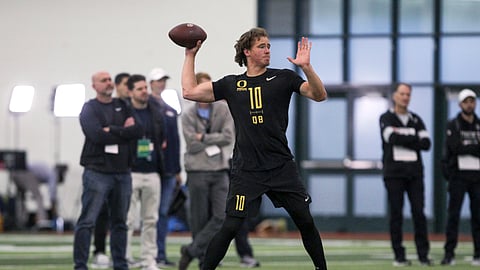 Quarterback Justin Herbert works out during Oregon football pro day in Eugene, Ore., Thursday, March 12, 2020.