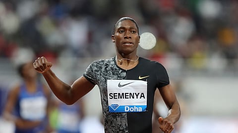 FILE - In this May 3, 2019, file photo, South Africa's Caster Semenya crosses the line to win the gold in the women's 800-meter final during the Diamond League in Doha, Qatar. Olympic champion Caster Semenya has run her first public race in eight months and says she will be back in top-level track despite currently being banned from competing in her favorite event. (AP Photo/Kamran Jebreili, File)