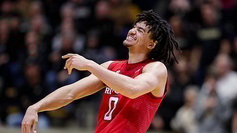 Rutgers guard Geo Baker (0) celebrates in the closing seconds of overtime in an NCAA college basketball game against Purdue in West Lafayette, Ind., Saturday, March 7, 2020. Rutgers defeated Purdue 71-68 in overtime. (AP Photo/Michael Conroy)