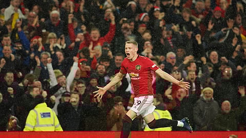 Manchester United's Scott McTominay celebrates after scoring his side's second goal during the English Premier League soccer match between Manchester United and Manchester City at Old Trafford in Manchester, England, Sunday, March 8, 2020.