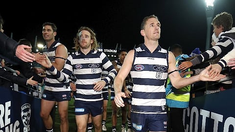 The Geelong Cats with fans who wont' be in attendance tonight.