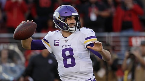 FILE - In this Jan. 11, 2020, file photo, Minnesota Vikings quarterback Kirk Cousins (8) passes against the San Francisco 49ers during the first half of an NFL divisional playoff football game in Santa Clara, Calif. The Minnesota Vikings and quarterback Kirk Cousins have agreed to a two-year contract extension, his agent Mike McCartney said Monday, March 16, 2020.(AP Photo/Marcio Jose Sanchez, File)