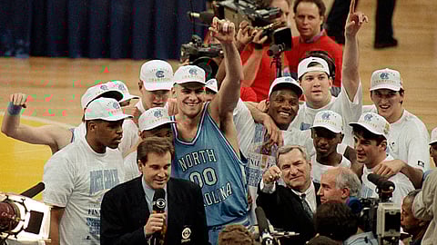 Dean Smith (lower right, pointing) celebrates his second National Championship in 1993