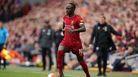 Liverpool's Sadio Mane controls the ball during the English Premier League soccer match between Liverpool and Bournemouth at Anfield stadium in Liverpool, England, Saturday, March 7, 2020.