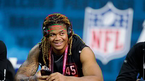 Ohio State defensive lineman Chase Young watches a drill at the NFL football scouting combine in Indianapolis, Saturday, Feb. 29, 2020.