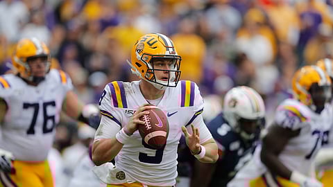 In this Oct. 26, 2019, file photo, LSU quarterback Joe Burrow (9) scrambles during the first half of the team's NCAA college football game against Auburn in Baton Rouge, La. Burrow is the top quarterback heading in the upcoming NFL draft.