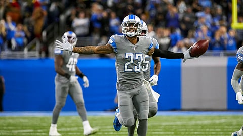 In this Nov. 28, 2019, file photo, Detroit Lions cornerback Darius Slay (23) celebrates an interception against the Chicago Bears during an NFL football game in Detroit. The Lions agreed to trade cornerback Darius Slay to the Philadelphia Eagles, ending the standout defensive back's seven-year stint in Detroit.