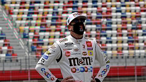 Driver Kyle Busch watches during qualifying for the NASCAR Cup Series auto race at Charlotte Motor Speedway Sunday, May 24, 2020, in Concord, N.C.