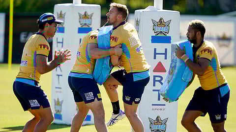 Gold Coast Titans' players of the National Rugby League train on the Gold Coast, Australia, Friday, May 15, 2020. The National Rugby League will restart its interrupted season on May 28.