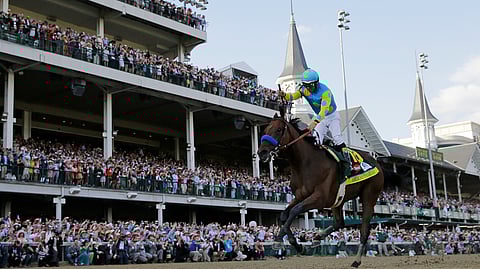 In this May 2, 2015, file photo, Victor Espinoza rides American Pharoah to victory in the 141st running of the Kentucky Derby horse race at Churchill Downs in Louisville, Ky. American Pharaoh went on to win the Triple Crown a few weeks later. More than a dozen thoroughbreds had come up a race short of becoming racing’s first Triple Crown winner since Affirmed in 1978, until American Pharoah ended the 37-year drought in 2015.