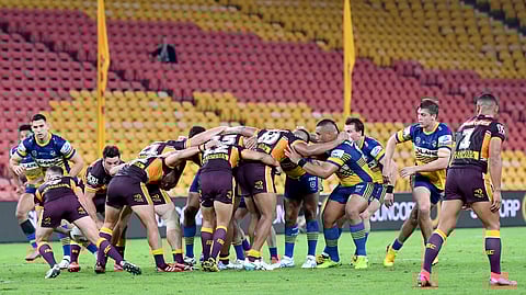 The Parramatta Eels and the Brisbane Broncos of the National Rugby League resumed play without spectators, Thursday, May 28, 2020, in Brisbane, Australia. This morning it's the Warriors vs. the Dragons. (Darren England/AAP Image via AP)