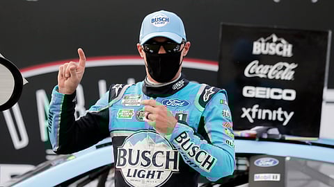 Kevin Harvick celebrates after winning the NASCAR Cup Series auto race Sunday, May 17, 2020, in Darlington, S.C.