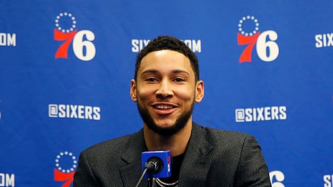 In this March 11, 2020, file photo, Philadelphia 76ers' Ben Simmons smiles while speaking at a news conference Philadelphia 76ers All-Star guard Ben Simmons is closer to getting cleared to play, should the NBA season resume. Simmons, the league leader in steals, was sidelined with nerve issues in his lower back when the season suspended was March 11 because of the coronavirus pandemic.