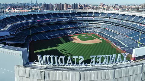 This March 26, 2020 file photo shows an empty Yankee Stadium on opening day due to COVID-19 coronavirus restrictions in the Bronx borough of New York. The Yankees and Mets will train in New York.