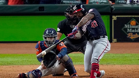 In this Oct. 30, 2019, file photo, Washington Nationals' Howie Kendrick hits a two-run home run against the Houston Astros during the seventh inning of Game 7 of the baseball World Series in Houston.