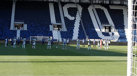 Players observe a minute of silence to honor the victims of coronavirus, prior to the Serie A soccer match between Atalanta and Sassuolo at the Gewiss Stadium in Bergamo, Italy, Sunday, June 21, 2020. Atalanta is playing its first match in Bergamo since easing of lockdown measures, in the area that has been the epicenter of the hardest-hit province of Italy's hardest-hit region, Lombardy, the site of hundreds of COVID-19 deaths.