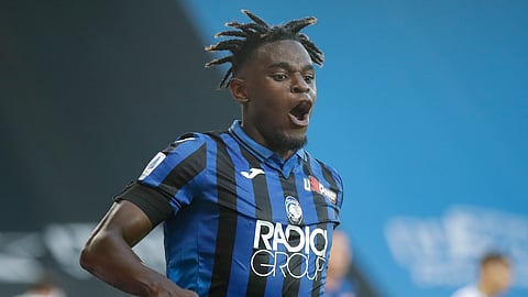 Atalanta's Duvan Zapata celebrates after scoring his side's fourth goal during the Serie A soccer match between Atalanta and Sassuolo at the Gewiss Stadium in Bergamo, Italy, Sunday, June 21, 2020. Atalanta is playing its first match in Bergamo since easing of lockdown measures, in the area that has been the epicenter of the hardest-hit province of Italy's hardest-hit region, Lombardy, the site of hundreds of COVID-19 deaths.