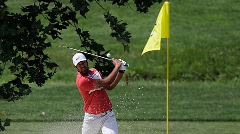 Tony Finau hits from a bunker toward the fourth green during the second round of the Memorial golf tournament, Friday, July 17, 2020, in Dublin, Ohio.