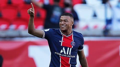 PSG's Kylian Mbappe reacts after scoring his side first goal during a friendly soccer match between Paris Saint Germain and Glasgow Celtic FC at Parc des Princes Stadium in Paris, Tuesday, July 21, 2020.