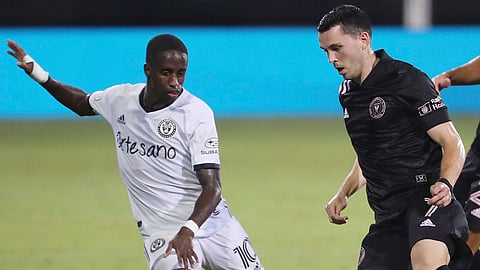 Inter Miami's Lewis Morgan (7) controls the ball in front of Philadelphia Union's Jamiro Montiero (10) during an MLS soccer match Tuesday, July 14, 2020, in Kissimmee, Florida.