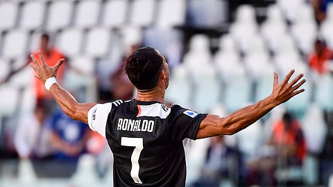 Juventus' Cristiano Ronaldo celebrates scoring his side's third goal, during the Serie A soccer match between Juventus and Torino, at the Allianz Stadium in Turin, Italy, Saturday, July 4, 2020.