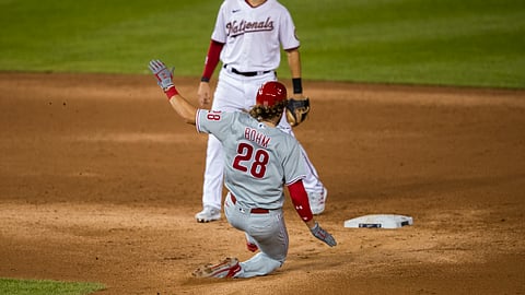 Philadelphia Phillies' Alec Bohm (28) slides safe to second as Washington Nationals' shortstop Trea Turner waits for the ball during the eighth inning of a baseball game in Washington, Tuesday, Aug. 25, 2020.