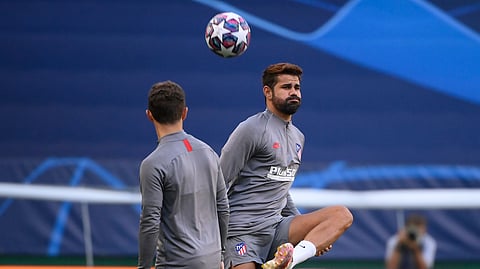 Atletico Madrid's Diego Costa, right, kicks the ball during a training session at the Jose Alvalade stadium in Lisbon, Wednesday Aug. 12, 2020. Atletico Madrid will play Leipzig in a Champions League quarterfinals soccer match on Thursday.