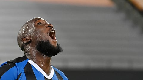 Inter Milan's Romelu Lukaku cheers after his goal for the 5:0 during a Europa League semi-final match between Inter Milan and Shakhtar Donetsk in Duesseldorf, Germany, Monday, Aug.17, 2020.