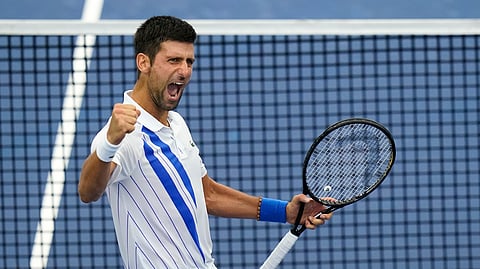 Novak Djokovic, of Serbia, reacts to winning his match with Milos Raonic, of Canada, during the finals of the Western & Southern Open tennis tournament Saturday, Aug. 29, 2020, in New York.