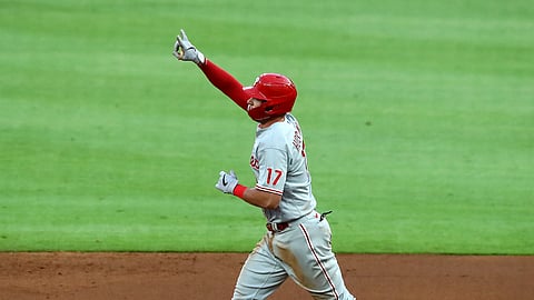 Philadelphia Phillies' Rhys Hoskins reacts after his two-run home run while rounding second base during the third inning of a baseball game against the Atlanta Braves, Sunday, Aug. 23, 2020, in Atlanta.