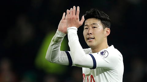 In this Wednesday, Jan. 22, 2020 file photo, Tottenham's Son Heung-min applauds fans after the end of the English Premier League soccer match against Norwich City at the Tottenham Hotspur Stadium in London, England.